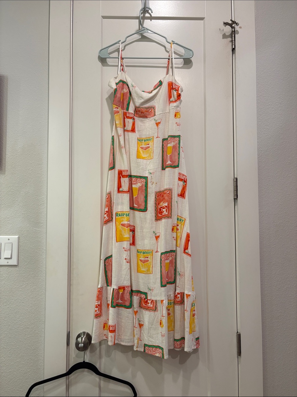 Sleeveless White Sundress with Orange & Yellow Print